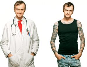 Doctor and tattooed man side by side.
